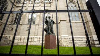 A statue of Pope John Paul II at the Cathedral Basilica of the Immaculate Conception was recently vandalized. Oct. 12, 2021.