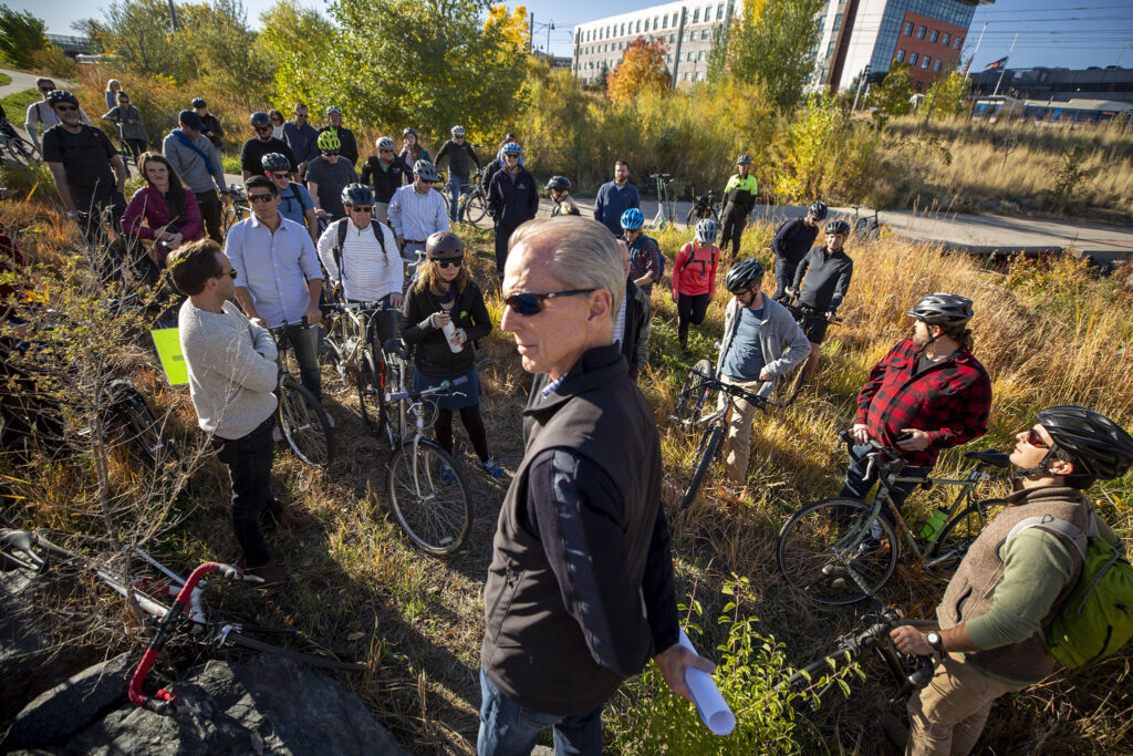 David Bennetts, of the Mile High Flood District, gives a presentation about the South Platte River to a bike tour group led by the Urban Land Institute. Oct. 20, 2021.