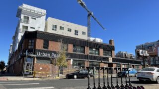 A new sign and fencing installed outside Urban Peak, October 29, 2021.