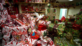 Wrapped gifts fill a room at Heritage Lakewood Belmar Park, part of Lonnie Hanzon's Camp Christmas. Dec. 2, 2021.