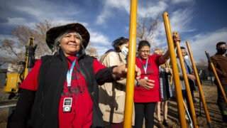 Angelina Torres holds a shovel before Tierra Colectiva breaks ground on five new affordable townhomes in Elyria Swansea. Dec. 8, 2021.