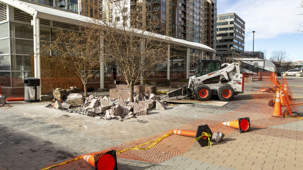 The benches above Union Station's bus depot are getting scraped from the earth. Dec. 15, 2021.
