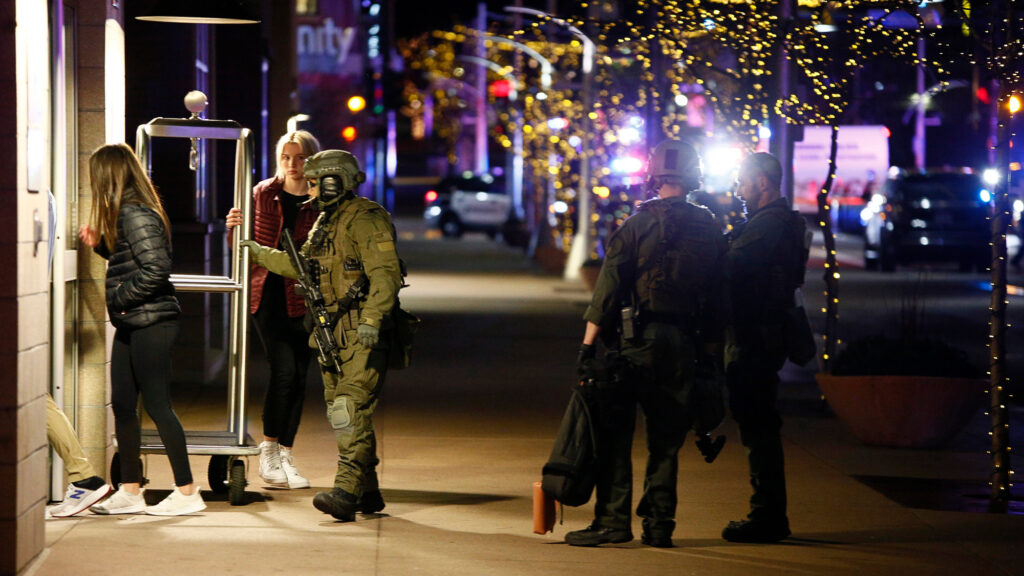 Members of Lakewood Sheriff's Department at Hyatt House, 7310 West Alaska Drive, Lakewood, on December 28, 2021, after a gunman was killed after fatally shooting five people and wounding several others including a police officer during a shooting spree in Denver and Lakewood.