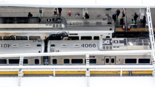 A view of RTD customers waiting for trains, seen from the Coloradan condo building on Wewatta Street. Jan. 25, 2022.