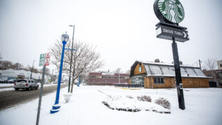 A barn-shaped Starbucks on East Colfax Avenue, just south of City Park. Jan. 27, 2022.