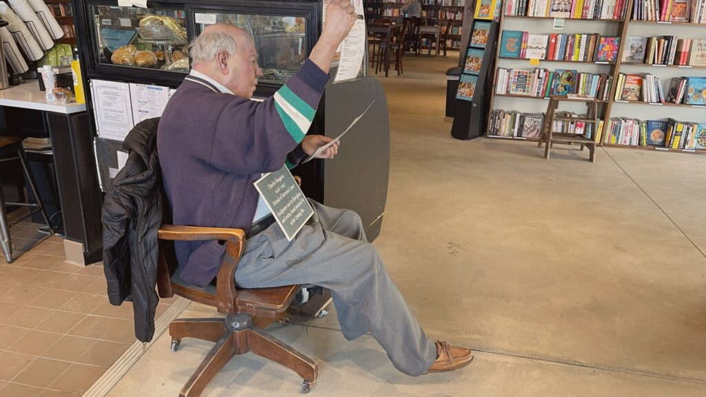 A sculpture of longtime Tattered Cover customer Charlie Shugarts, inside Westminster's new Tattered Cover.
