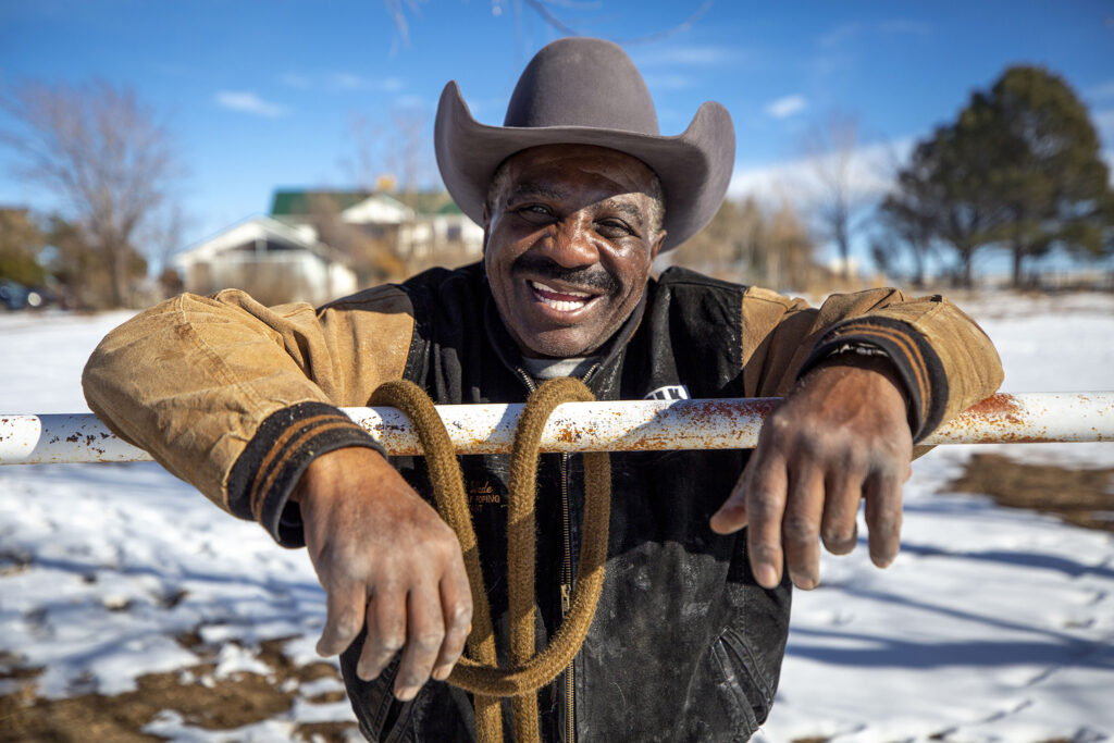 Maurice Wade hangs out on a ranch in Bennett, Colo., where his horse, Beer Money, lives. Jan. 29, 2022.