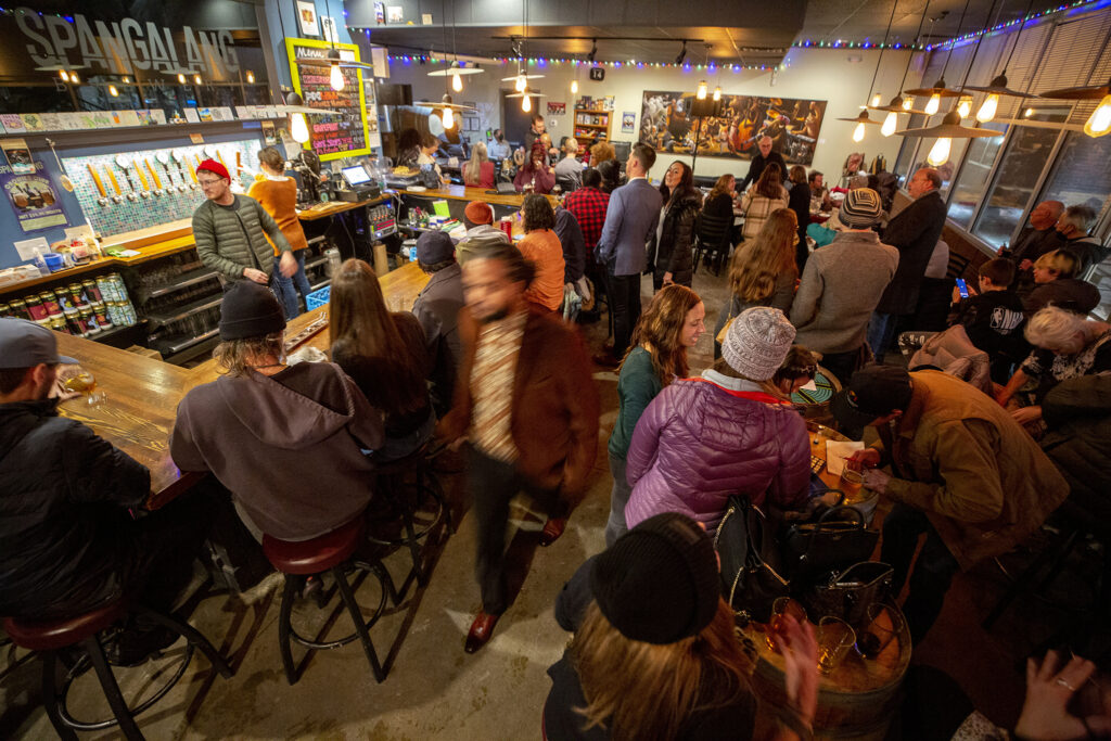 Spangalang Brewery is filled up even before the band starts during a fundraising event benefitting the Welton Street Cafe. Feb. 4, 2022.