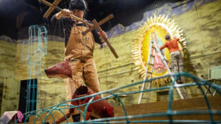 Lisa Hori-Garcia practices with a marionette during a rehearsal of "Refuge" at Curious Theatre. March 2, 2022.