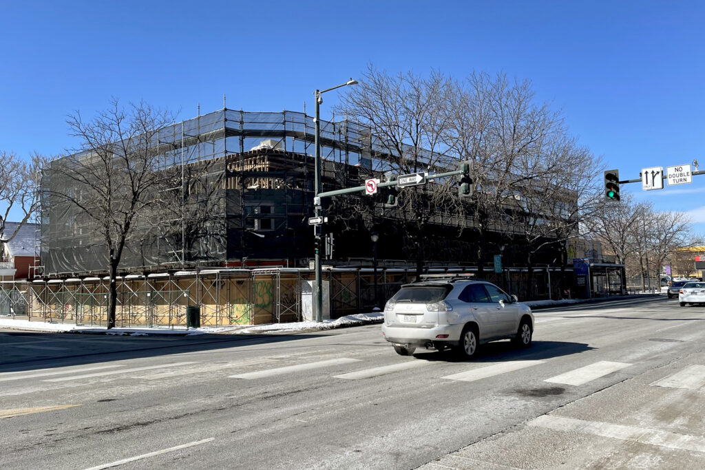 As scaffolding rises at the Smiley's Laundromat site, here's what we know