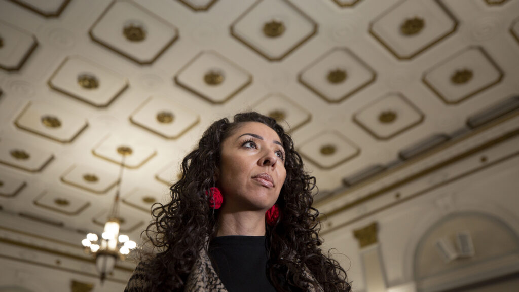 Denver City Council member Candi CdeBaca stands in the legislative body's main chambers at the City and County Building. March 16, 2022.