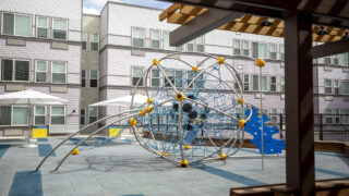 A playground at the Stella affordable housing building in Globeville. March 16, 2022.