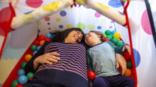 Sylvia and Bodhi Johnston play in a ball pit in Bodhi's room. March 26, 2022.