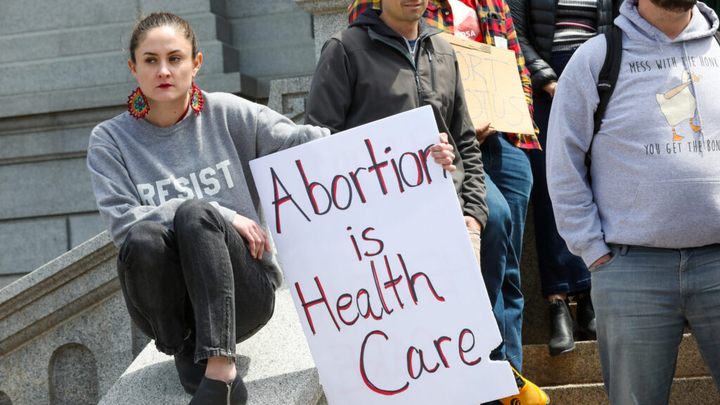 Abortion rights supporters gathered on the state Capitol steps in Denver on Tuesday after a leaked draft opinion from the U.S. Supreme Court called for overturning Roe vs. Wade.