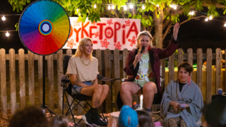 From Rainbows and Revolutions at History Colorado: Lee Robinson and Kate McLachlan perform at a backyard Dyketopia comedy show, 2021. Credit: Photo by Nick Holmby. Courtesy Lee Robinson.