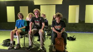 Grayson Allensworth (right) and the cast of Be More Chill.