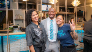 At center, Denver City Council District 9 candidate Kwon Atlas