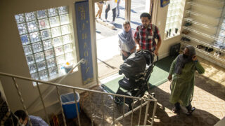 Shahnaz Hussaini and Abdul Mohedi walk into a Northglenn mosque where an asylum clinic has been set up for resettled Afghans like them. June 4, 2022.