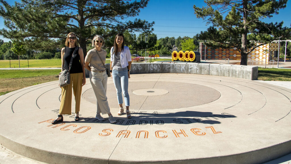 Landscape architects Gretchen Wilson (left to right), Laurel Raines and Elizabeth Milan stand on Paco Sanchez Park's stage (which also has a secret sound phenomenon built in). July 7, 2022.