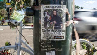 A ghost bike for Javin Odegard at the place where he was struck by a driver on 6th Avenue. July 20, 2022.