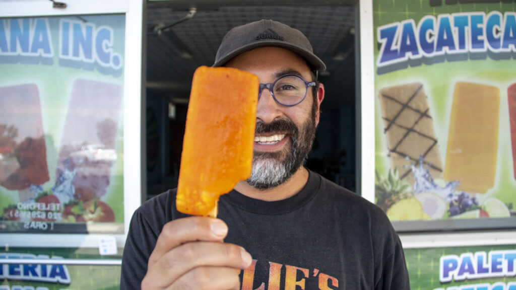 Manuel Aragon likes Paleteria Zacatecas' mango chile pops. July 27, 2022.