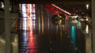 Cars remain stranded on the new I-70 underpass through Elyria Swansea after heavy rains flooded the area on Aug. 7, 2022.