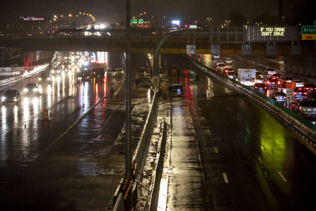 Cars remain stranded on the new I-70 underpass through Elyria Swansea after heavy rains flooded the area on Aug.  7, 2022.