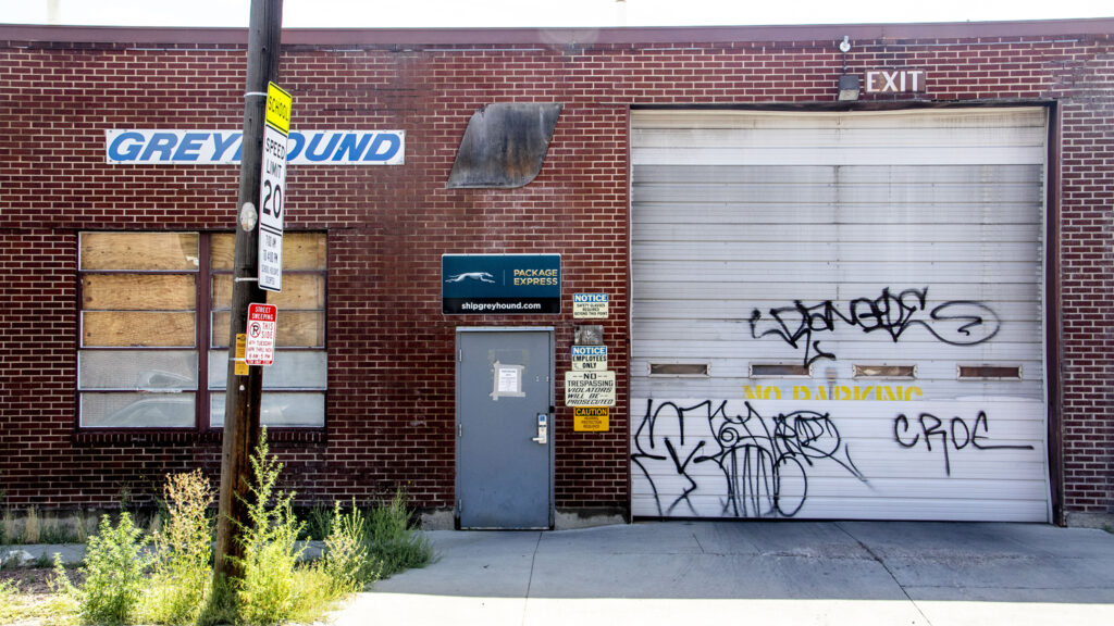 The old Greyhound bus maintenance facility at 2450 Curtis Street. Aug. 17, 2022.