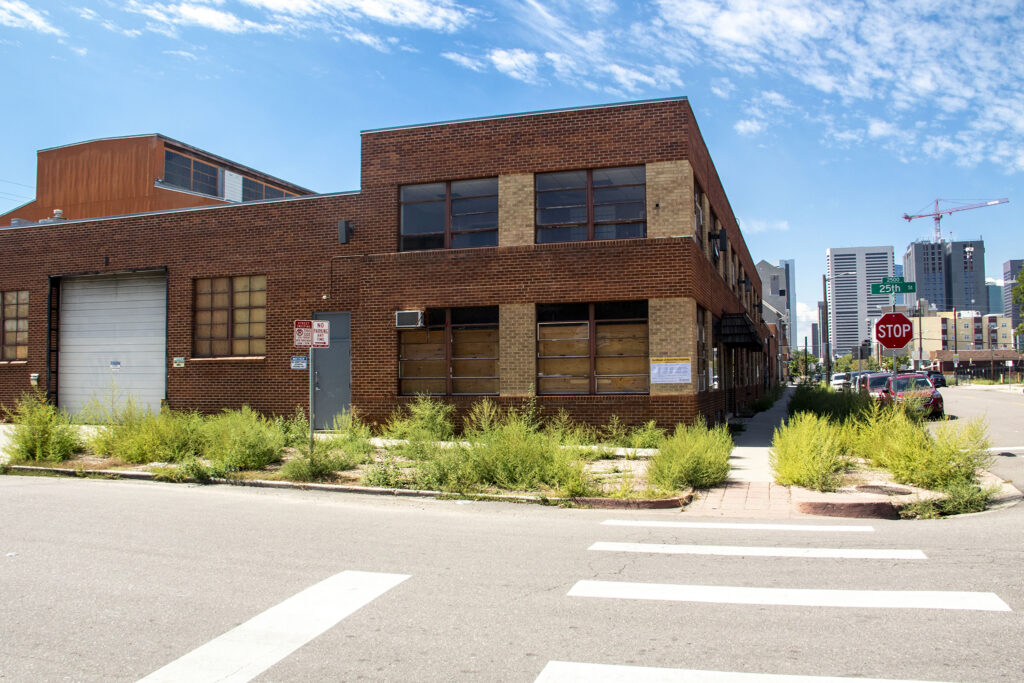 The old Greyhound bus maintenance facility at 2450 Curtis Street. Aug. 17, 2022.