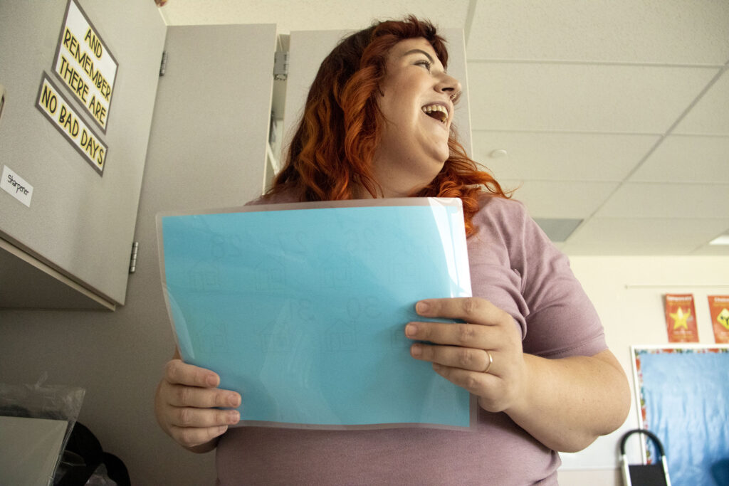 Ellen Petrila prepares for the first day of school in her classroom at Lowry Elementary. Aug. 18, 2022.