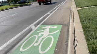 New bike lanes on Central Park Boulevard include a cycling dog, August 5, 2022.