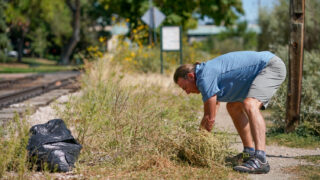 On the South Platte Trail in Denver, “Goathead Greg” Skomp gets after the weed that menaces bike tires and pets’ feet. Wednesday, Sept. 20, 2022.