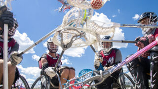 The Colorado Rolling Mammoth touch off to take on the Milwaukee Eagles in the U.S. wheelchair lacrosse national championship in Aurora. Aug. 27, 2022.