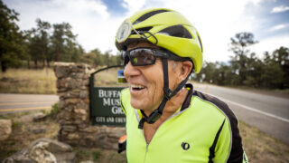 Chuck Haraway stands at the summit of Lookout Mountain after his 3,429th bicycle ascent. Sept. 14, 2022.