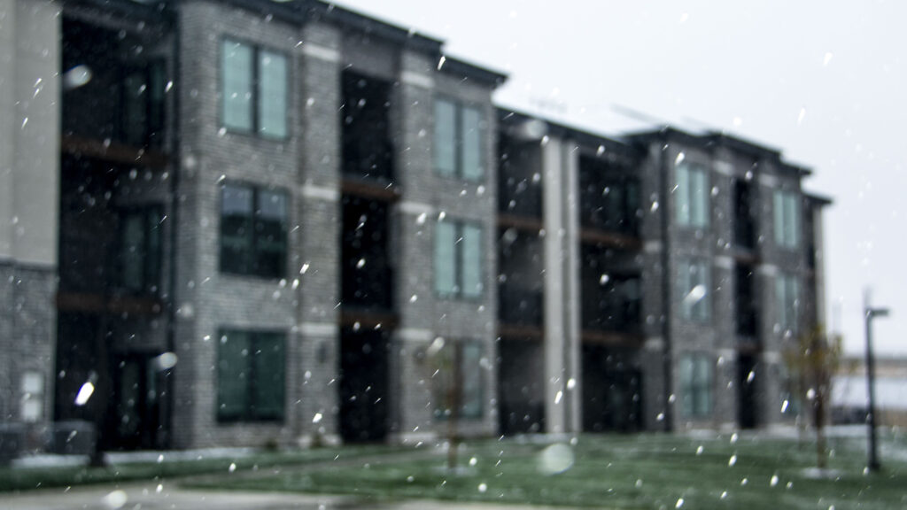 Snow falls over new affordable apartments at the Reserves At Green Valley Ranch. Oct. 27, 2022.