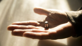 Keith Clasen holds a bullet he found near his Barnum home. Nov. 18, 2022.