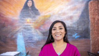 State Rep. Serena Gonzales-Gutierrez stands at 41st Avenue and Tejon Street, the site of Servicios De La Raza's old headquarters where she spent a lot of time as a kid. Nov. 19, 2022.