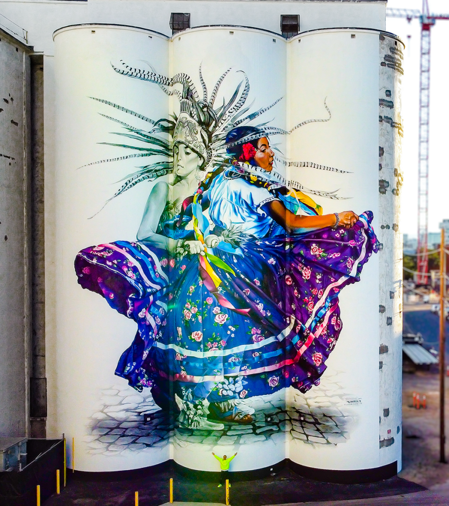 Bimmer Torres' mural "Mitotli" on the silos of Ardent Mills Flour Refinery.