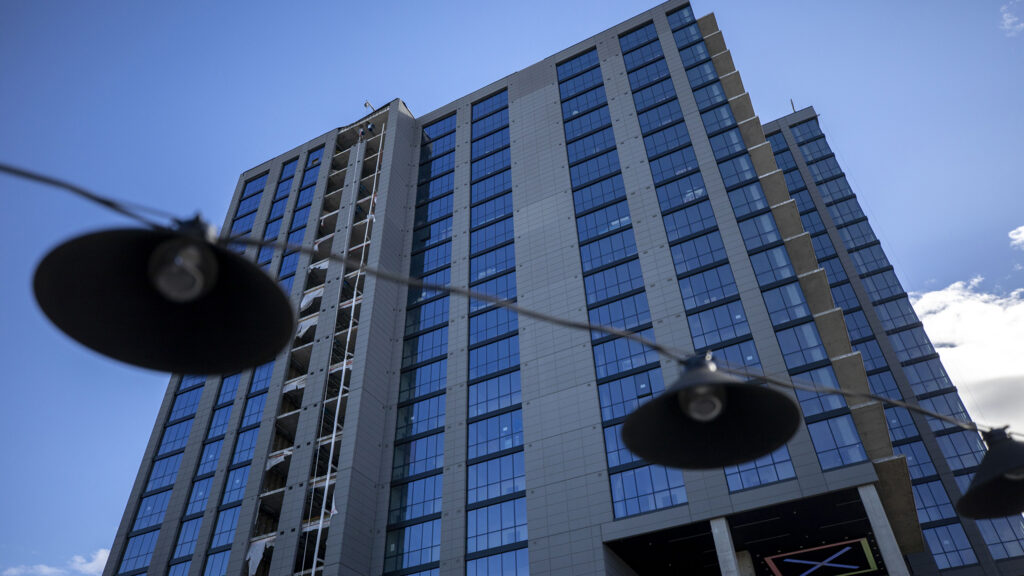 A nearly-complete building in Five Points, seen from the roof of Rocky Mountain Public Media's new headquarters and 21st and Arapahoe Streets. Dec. 9, 2022.