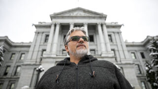 Mayoral candidate Robert Treta stands on the Capitol's west steps, where he had an epiphany during protests in 2020 that he should run for office. Dec. 30, 2022.