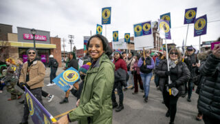 Mayoral candidate Lisa Calderón marches with supporters in Denver's annual Martin Luther King Jr. Day Marade. Jan. 16, 2023.