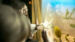 A group of kids from Ukraine visit the Denver Museum of Nature and Science. Feb. 6, 2023.