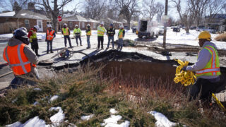 The hole at E. 9th Avenue and Eudora Street on Feb. 2, 2023. The break occurred at 3 a.m. Thursday and no injuries were reported.