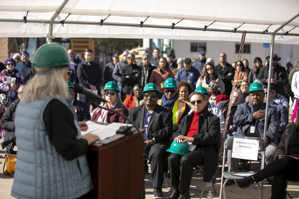 Donna Garnett, executive director of the Montbello Organizing Committee, speaks during a groundbreaking for the FreshLo grocery and community project in Montbello. March 2, 2023.  Kevin J. Beaty/Denverite