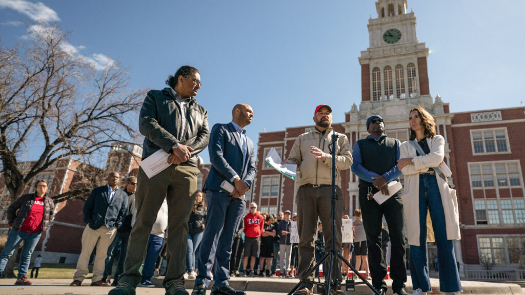 The Denver East High School Parents - Safety Advocacy Group, including Steve Katsaros, speaking at center, gathered outside the school Monday morning April 3, 2023 to launch a weekly effort called Make Change Monday -- press briefings aimed at demanding transparency and action on the part of Denver Public Schools following recent shootings at East, and gun violence at other campuses.