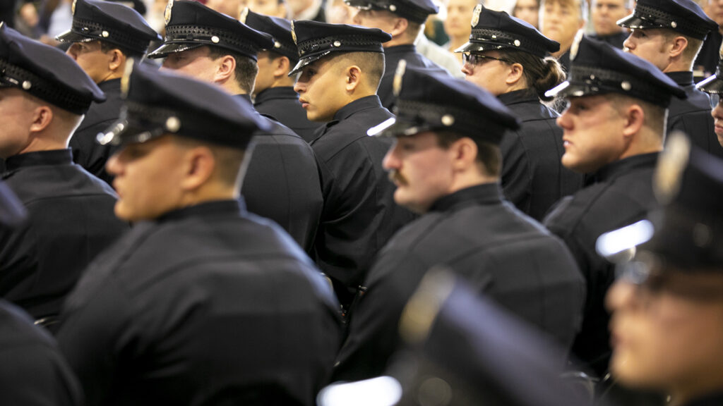 A class of cadets graduate from the Denver Police Academy in Central Park. March 31, 2023.
