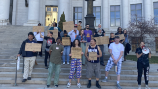 Aloft residents and advocates held a press conference outside City Council advocating to keep the hotel open to people experiencing homelessness. April 10, 2023.