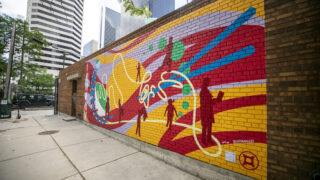 A mural by Nalye Lor on the side of Denver Fire's station 4 downtown. June 21, 2023.