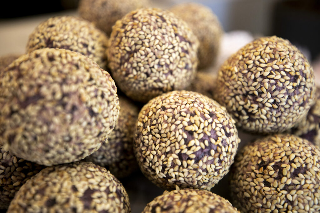 Sesame treats for sale at Ti Cafe on South Broadway. June 22, 2023.