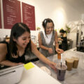 Sashaline and Shasitie Nguyen prep drinks behind the bar at Ti Cafe on South Broadway. June 24, 2023.